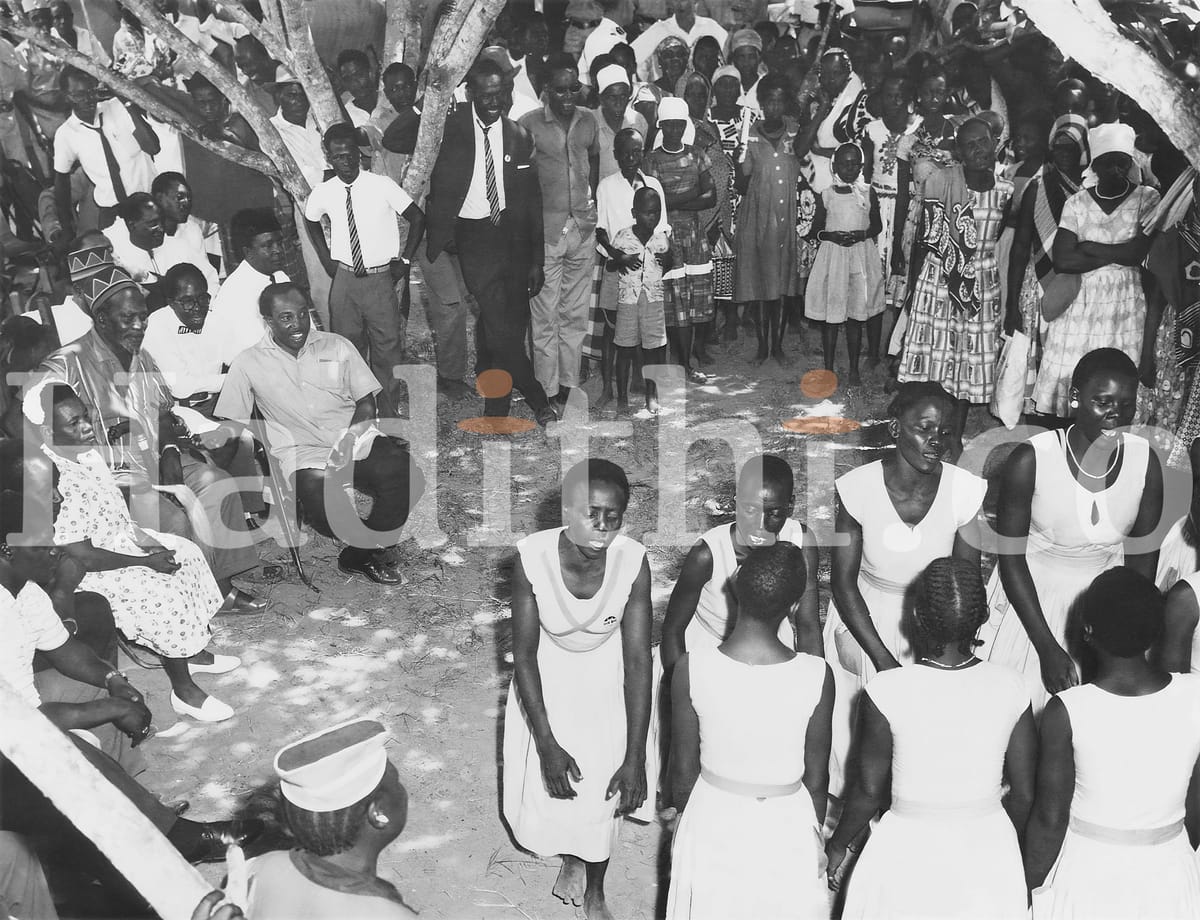 A women dance group performing for Kenya's first prime minster Jomo Kenyatta.